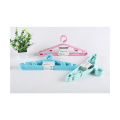 Wholesale New Style Clothes Hanger Plastic Folding Clothing Hanger